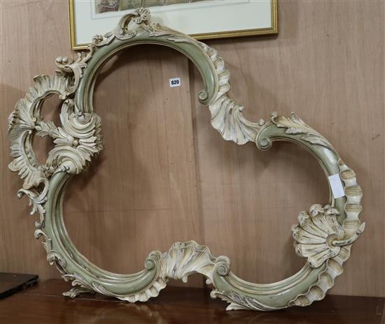 A pair of Louis XV style carved and painted walnut frames W.76cm